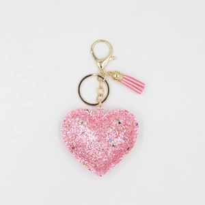 Porte-clés cœur rose pailleté avec sequins étoiles colorés et pendentif à pompon assorti