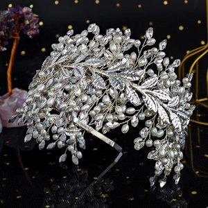 Luxurious handmade bridal headband with silver metal leaves, white pearls and crystals