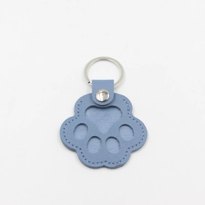Blue cat paw leather keychain with silver metal ring and detailed stitching design