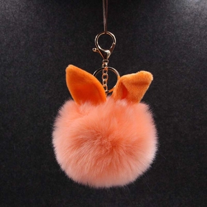 Porte-clés en peluche orange avec oreilles de lapin et mousqueton doré