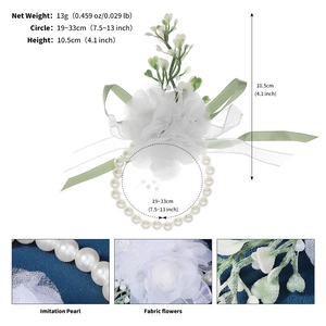 Detailed view of white fabric wedding wrist corsage with size and weight specifications