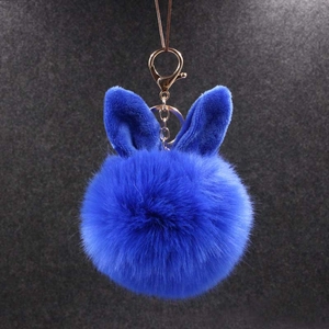 Porte-clés pompon en fausse fourrure bleu roi avec oreilles de lapin et anneau doré