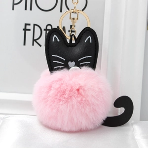 Cute pink plush cat ball keychain with black leather ears and golden metal clasp