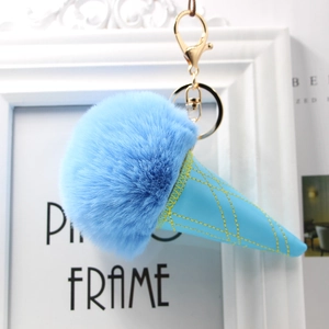 Detail of blue ice cream fur pom pom keychain with quilted PU cone and golden clasp