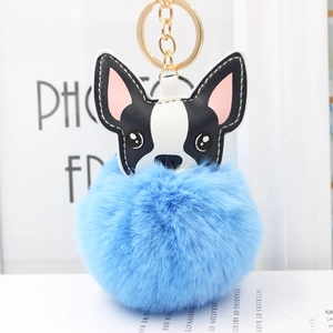 Portachiavi a forma di cane con pompon in ecopelliccia azzurro e anello in oro