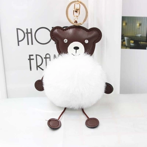 Cute brown bear faux rabbit fur keychain with fluffy white pom pom and golden ring