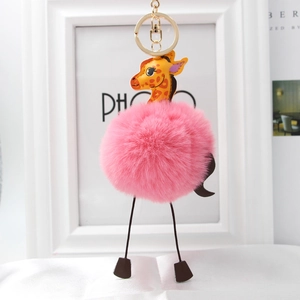 Giraffe plush keychain with pink pompom and gold ring for handbag or car keys