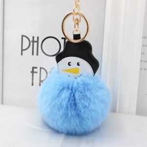 Porte-clés pompon bonhomme de neige en fausse fourrure bleu ciel avec fermoir doré