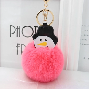 Porte-clés bonhomme de neige en fausse fourrure rose avec clip doré pour sacs