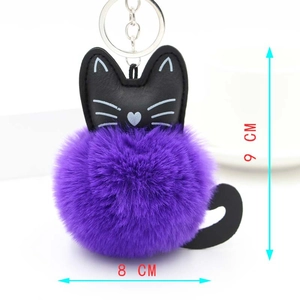 Detailed view of purple plush cat keychain showing 9 cm height and 8 cm width dimensions