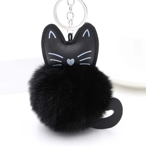 Cute black plush cat pompom keychain with white embroidery and silver metal ring