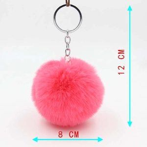 Close-up of pink faux rabbit fur keychain showing 8 cm diameter and silver metal ring