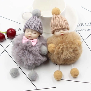 Cute sleeping baby plush keychain with knit hat and soft pompom for bag accessories