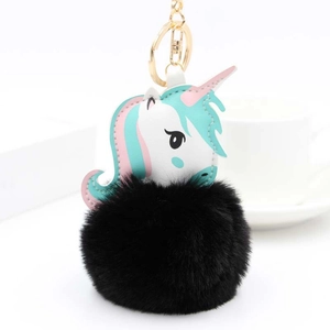 Porte-clés licorne bleu avec pompon en fausse fourrure noire et mousqueton doré chic