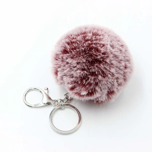 Soft faux fur pompom keychain in dusty rose pink with silver metal lobster clasp and ring