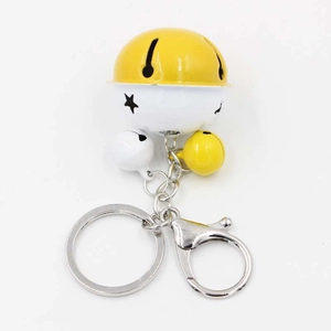 Detail shot of tricolor bells keychain with star cutout and silver metal lobster clasp