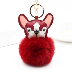 Porte-clés chien mignon en peluche avec pompon rouge et anneau en métal doré brillant