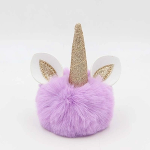 Unicorn plush keychain with purple faux rabbit fur pom pom and gold horn for bag decor
