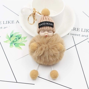 Plush sleeping baby keychain with pink knitted hat and golden metal lobster clasp