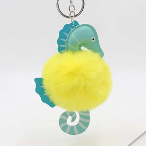 Creative seahorse plush keychain with mint green leather and yellow pompom ball