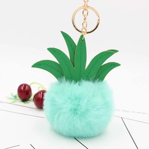 Creative mint green pineapple plush pompom keychain with green faux leather leaves