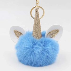Blue unicorn plush ball keychain with a glittery gold horn and metal ring for bags