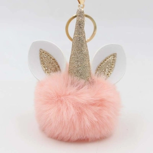 Pink plush unicorn pompom keychain with golden glitter horn and metal ring clasp