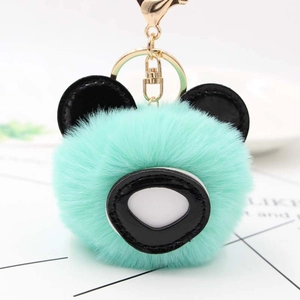 Porte-clés panda en peluche vert menthe avec fausse fourrure et fermoir mousqueton