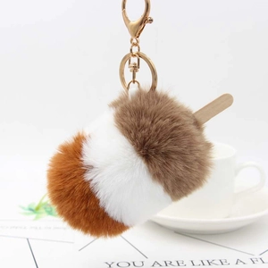 Portachiavi a forma di ghiacciolo in peluche con pompon a tre colori e anello dorato