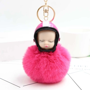 Cute sleeping doll keychain with pink helmet and fluffy plush fur ball gold clasp