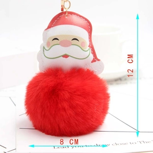 Detail view of Santa Claus plush pendant with 8cm red faux fur ball and golden clasp