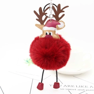 Festive red faux fur reindeer keychain with leather antlers and silver metal ring