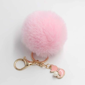 Pink fluffy faux fur keychain with golden cat charm and pearl detail for bags