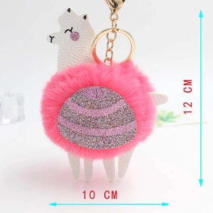 Pink alpaca plush keychain with purple sequins measuring 12cm height and 10cm width
