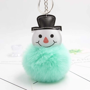 Porte-clés bonhomme de neige de Noël avec pompon en fausse fourrure vert menthe