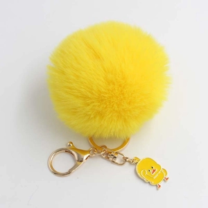 Portachiavi con pompon giallo a forma di anatra con gancio dorato e ciondolo cartoon