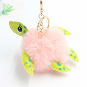 Cute pink plush turtle keychain with green polka dot PU leather limbs and golden metal clasp