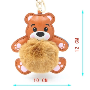 Detail der Teddybär-Schlüsselanhänger Maße von 12cm Höhe mit weichem Plüsch-Pompon