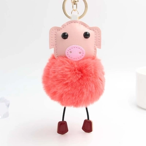 Porte-clés cochon en cuir rose avec pompon en peluche corail et anneau doré