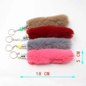 Plush faux fox tail keychains in four colors with metal ring, size 18cm by 5cm
