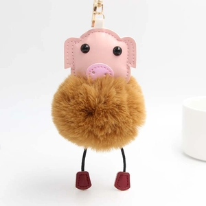 Porte-clés cochon rose avec pompon en peluche marron et fermoir mousqueton doré