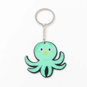 Porte-clés poulpe de dessin animé vert avec finition brillante et anneau en métal argenté