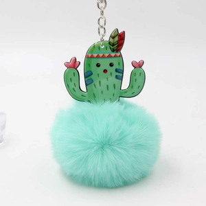 Mint green plush cactus keychain with acrylic pendant and fluffy faux fur ball
