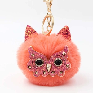 Cute coral orange owl faux fur ball keychain with gold clasp and pink glitter details
