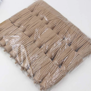 Detail of khaki PU leather tassels with ring attachment for keychains and bag charms