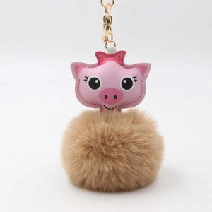 Porte-clés tête de cochon rose en peluche avec pompon kaki et clip doré
