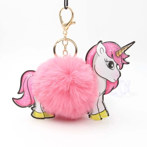 Creative unicorn keychain with pink fluffy pom pom and golden metal clasp for bags
