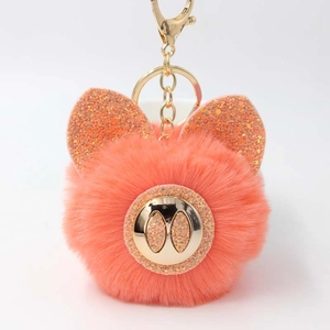 Porte-clés cochon en peluche orange avec oreilles pailletées et clip doré