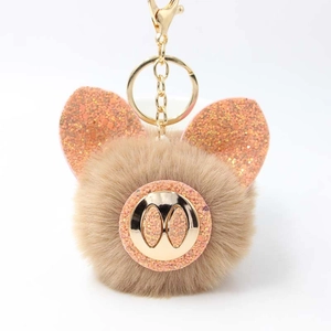 Porte-clés cochon mignon en peluche marron avec sequins orange et mousqueton doré