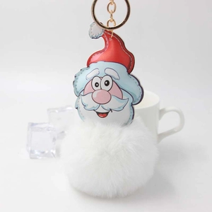 Cartoon Santa Claus plush keychain with white faux fur pompom and gold hardware